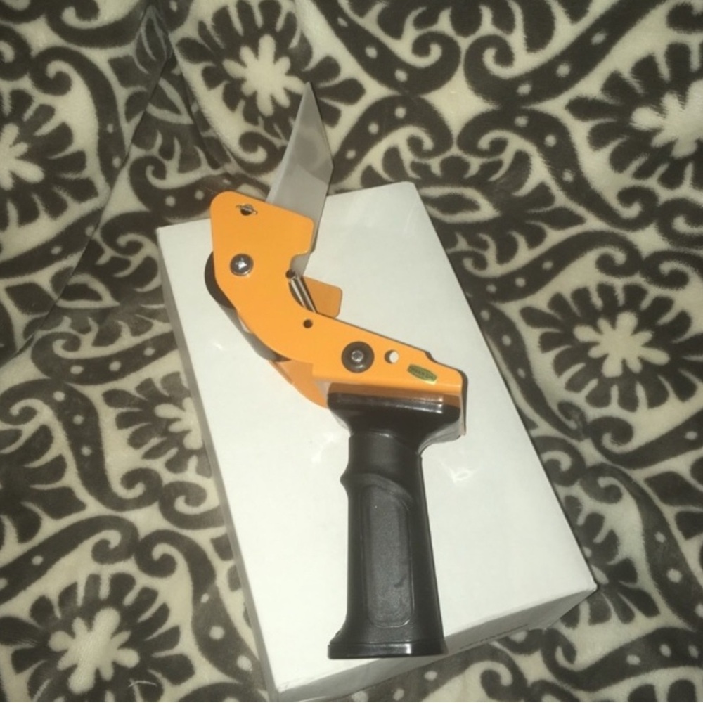 Orange and Black Handheld Tool